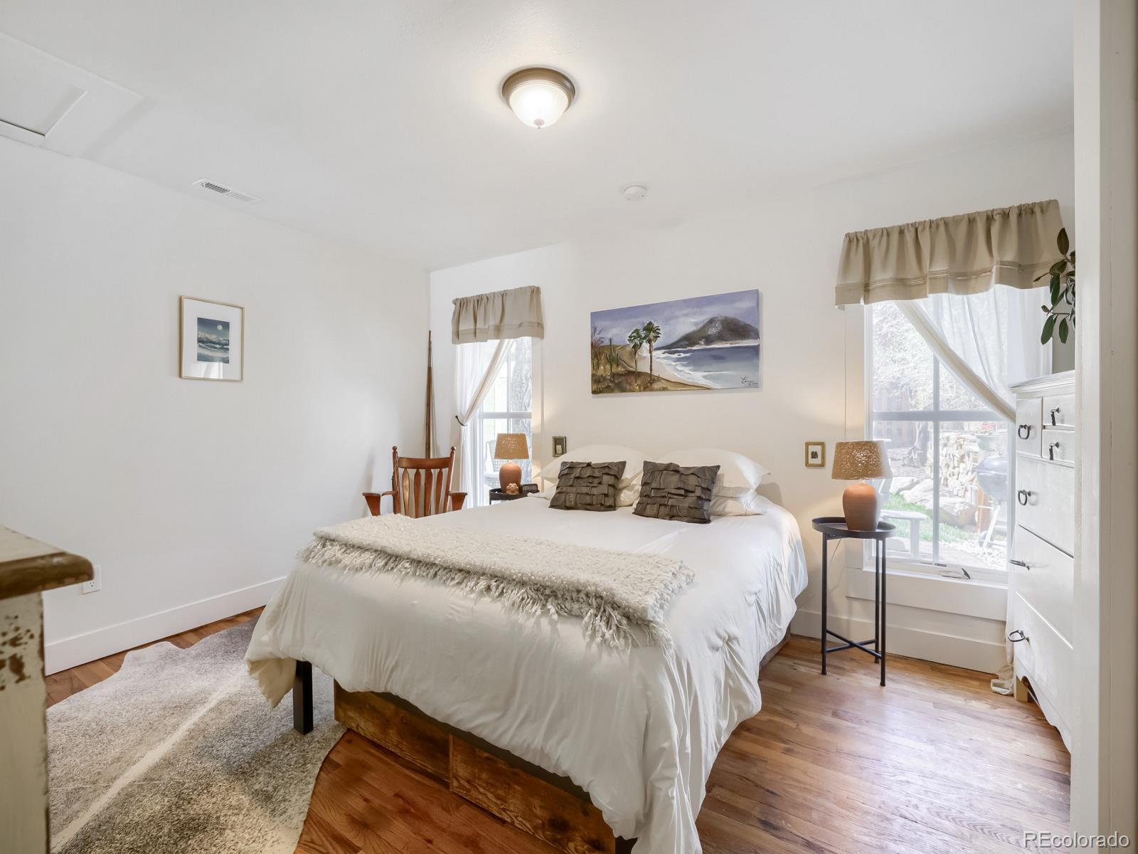 407 Seventh Street Georgetown, CO 80444 - Photo 15 of 28 a bedroom with a bed and a table