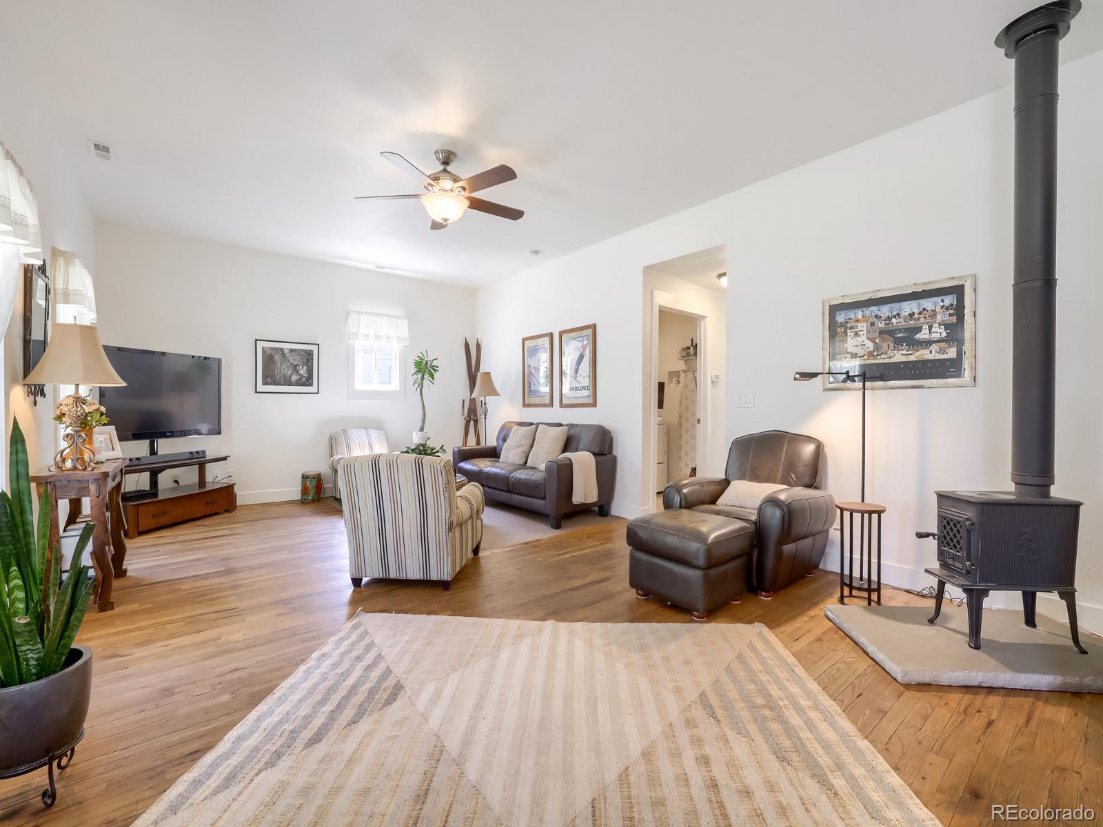 407 Seventh Street Georgetown, CO 80444 - Photo 4 of 28 a living room with furniture and wooden floor