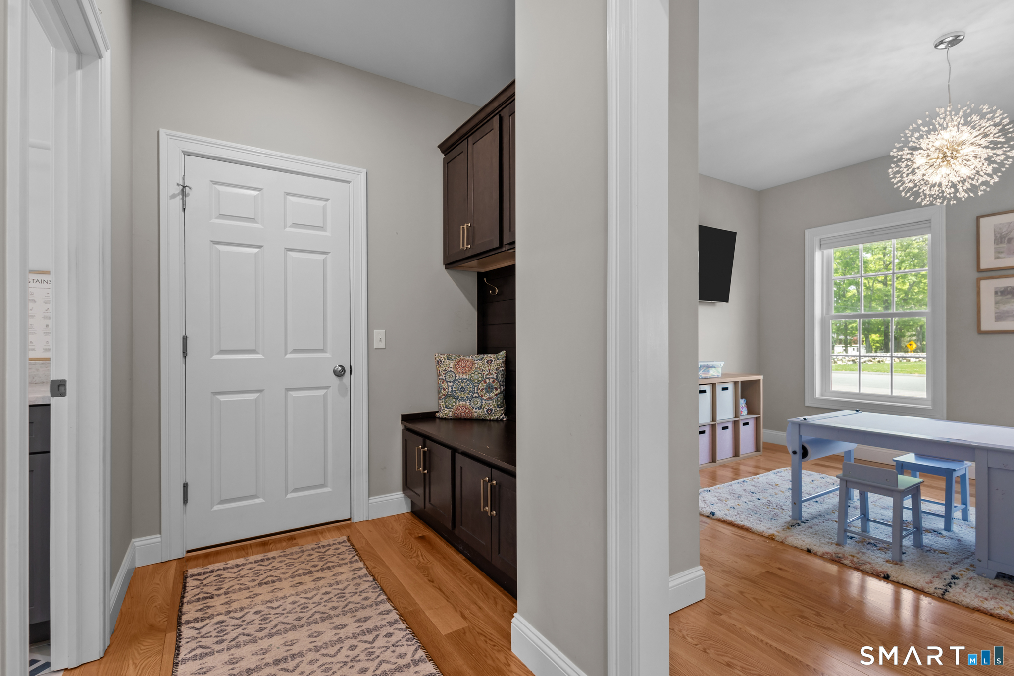 2 Martys Way Gales Ferry, CT 06335 - Photo 12 of 40 a view of a hallway and an dining rom with furniture