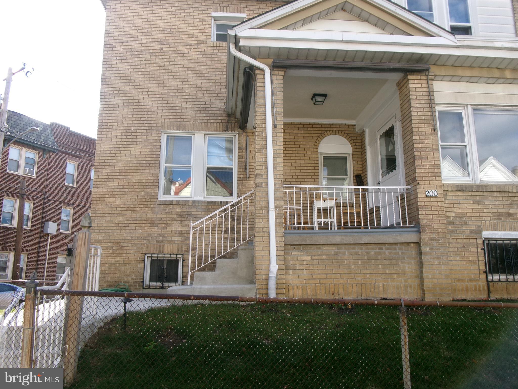 200 Wembly Road Upper Darby, PA 19082 - Photo 1 of 47 a view of front of a house with a yard