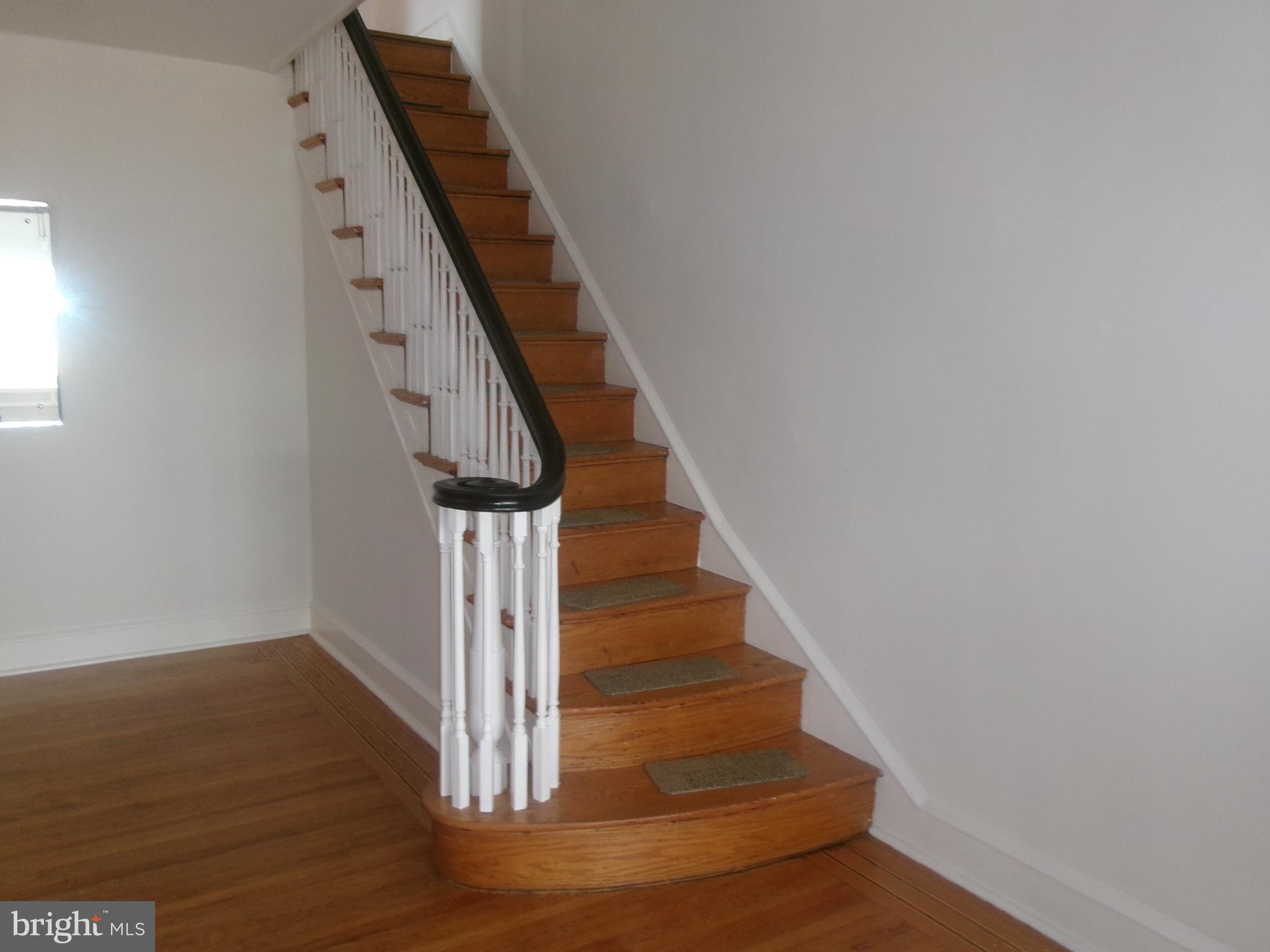 200 Wembly Road Upper Darby, PA 19082 - Photo 13 of 47 a view of entryway and hall with wooden floor