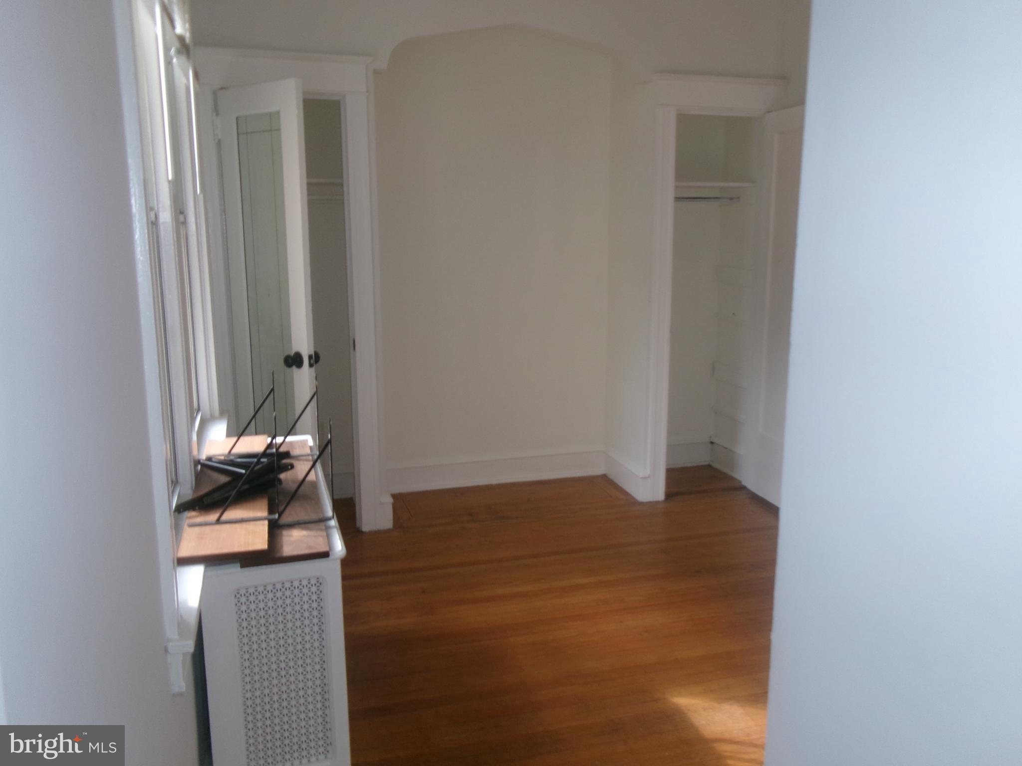 200 Wembly Road Upper Darby, PA 19082 - Photo 17 of 47 a room that has a bed and a window