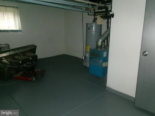 a bathroom with a toilet and a sink