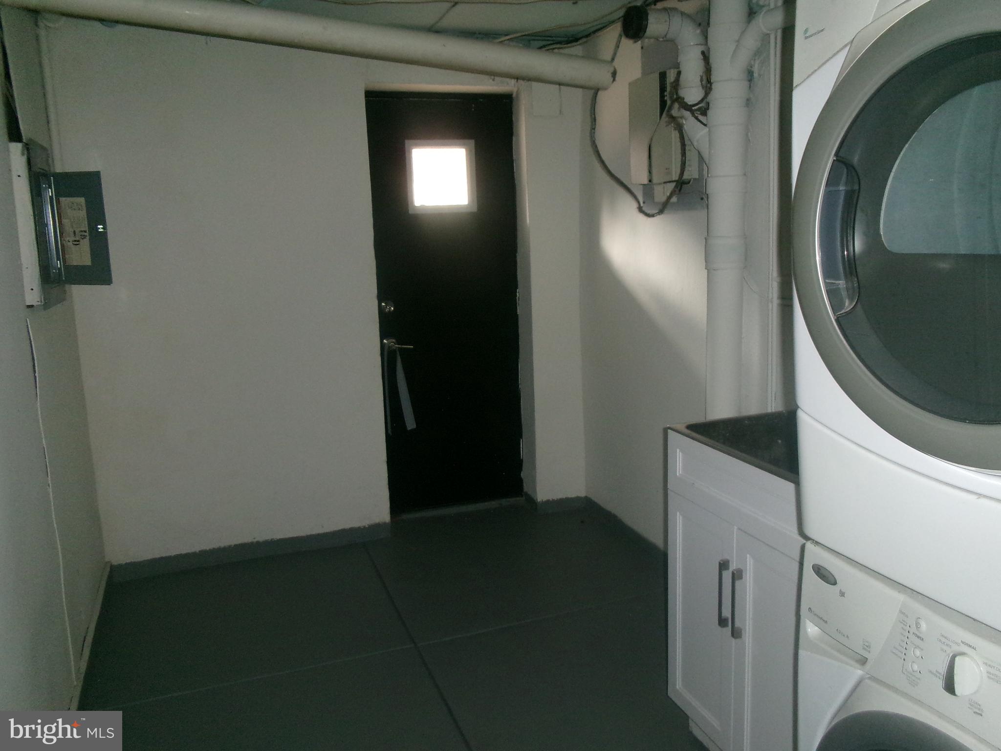200 Wembly Road Upper Darby, PA 19082 - Photo 31 of 47 a kitchen with a refrigerator and washer