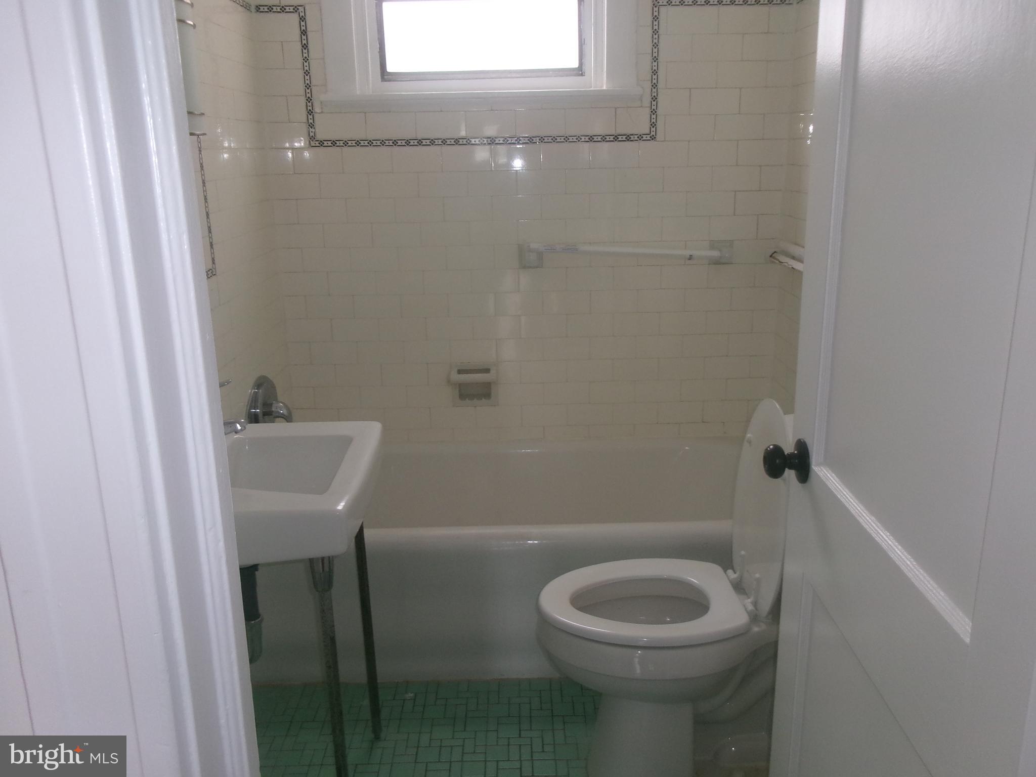 200 Wembly Road Upper Darby, PA 19082 - Photo 34 of 47 a bathroom with a toilet and a sink