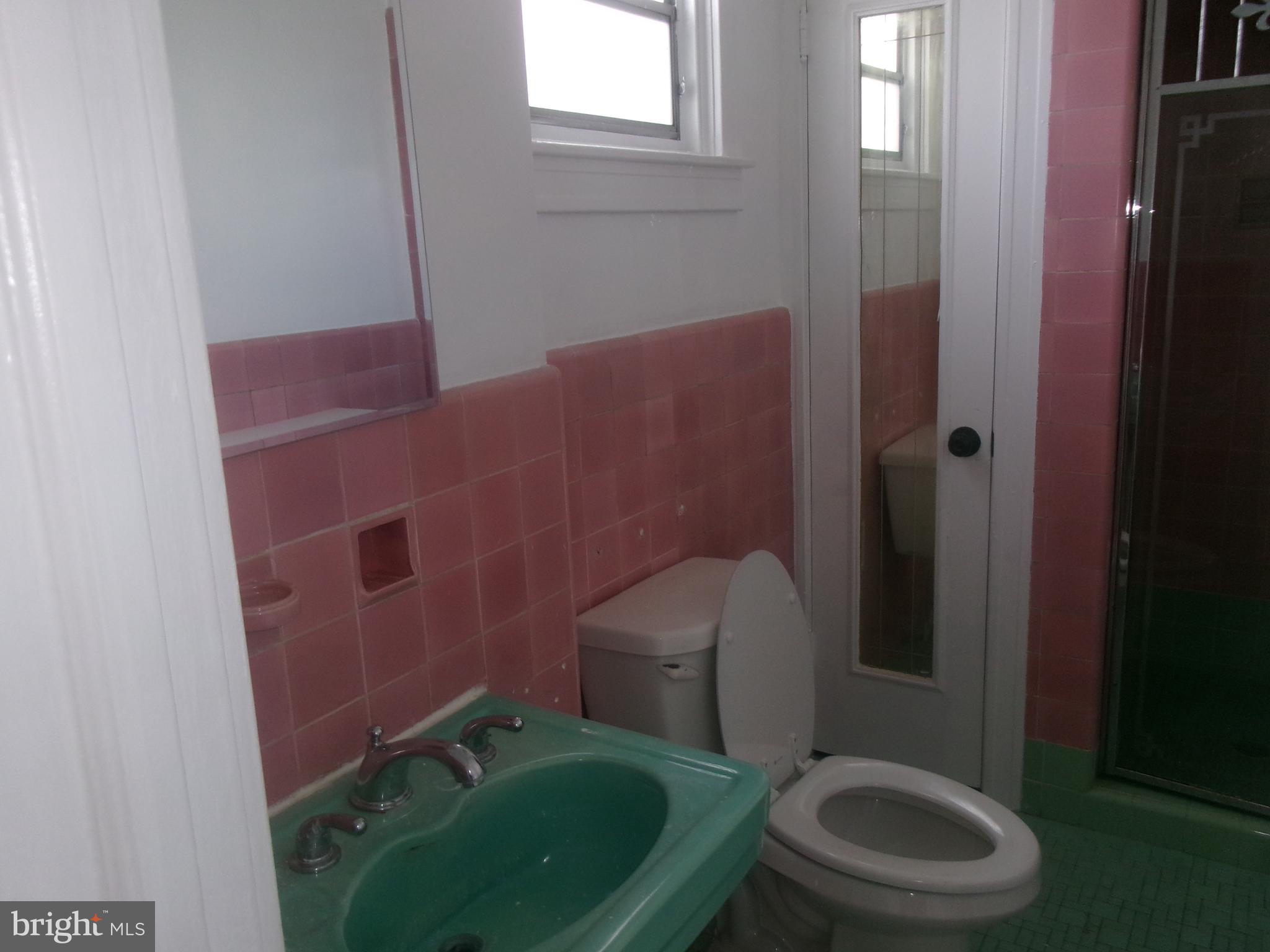 200 Wembly Road Upper Darby, PA 19082 - Photo 40 of 47 a bathroom with a toilet and a sink