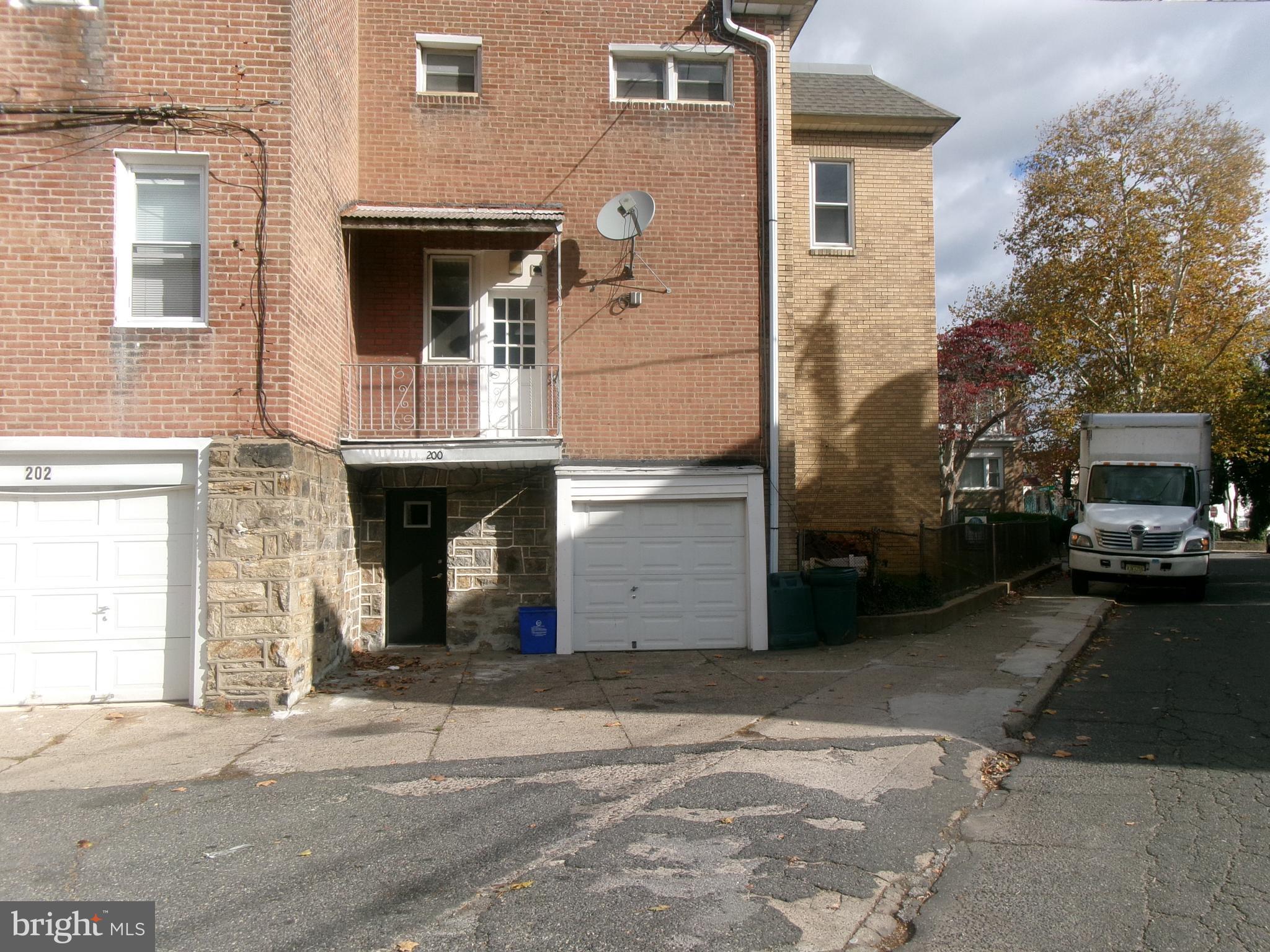 200 Wembly Road Upper Darby, PA 19082 - Photo 6 of 47 a view of a car park front of a house
