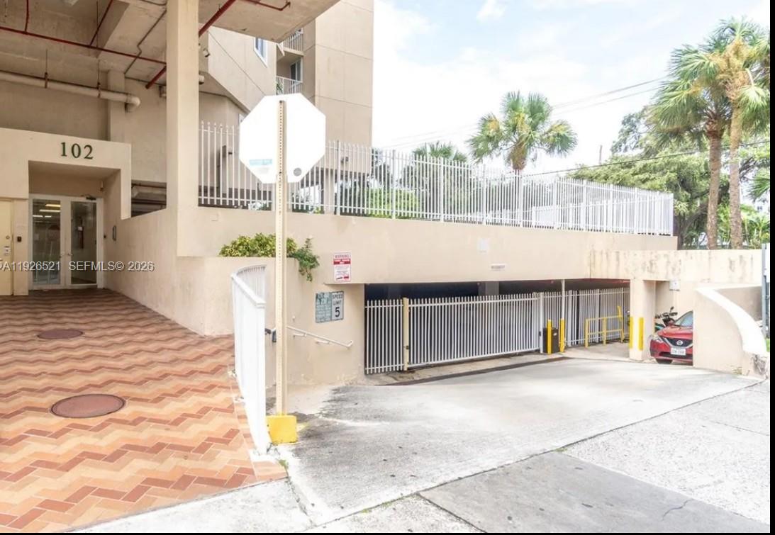 102 Southwest 6th Avenue, Unit 604 Miami, FL 33130 - Photo 2 of 13 a front view of a building with entryway