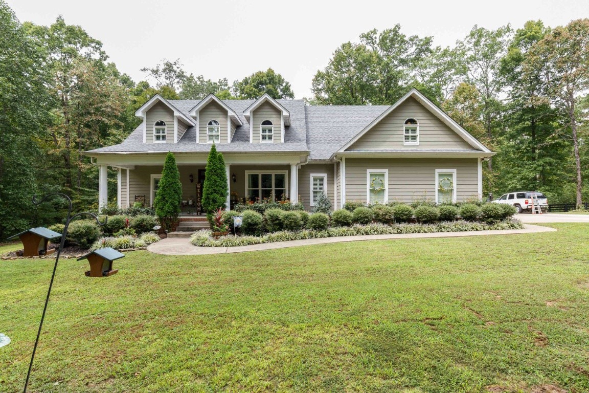 a front view of a house with swimming pool