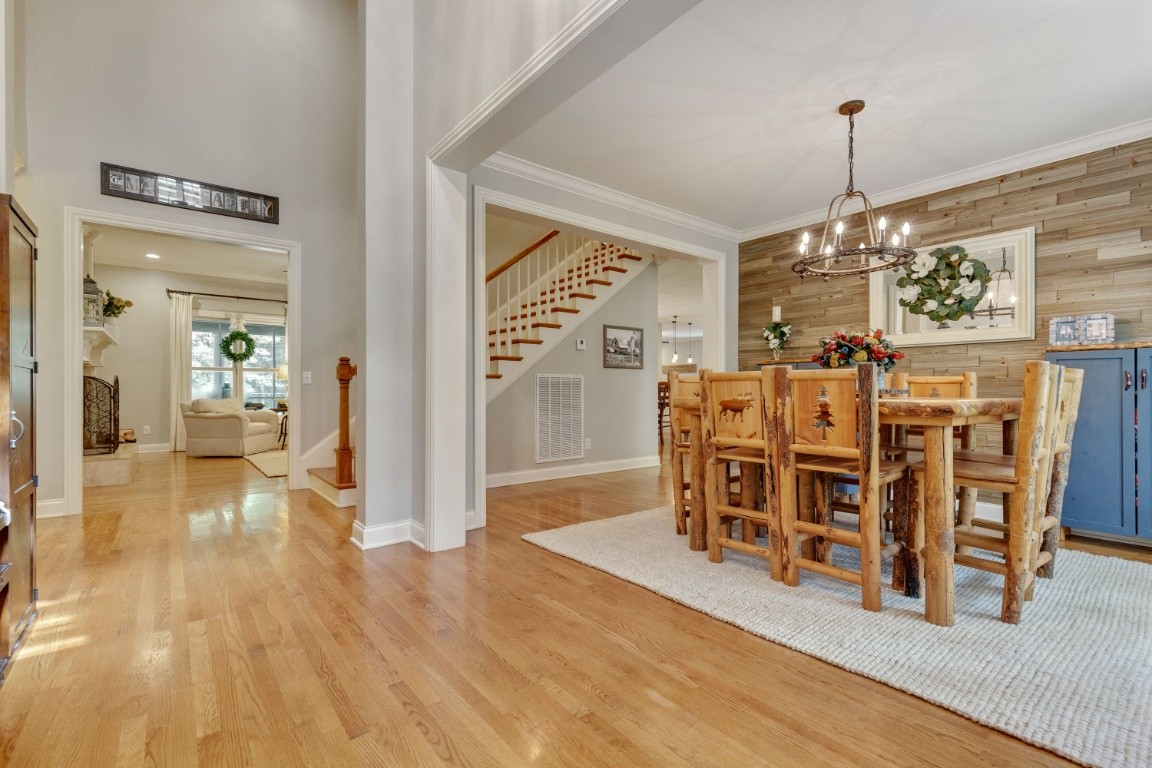 5660 Pinewood Road Franklin, TN 37064 - Photo 4 of 45 a view of a dining room with furniture window and wooden floor