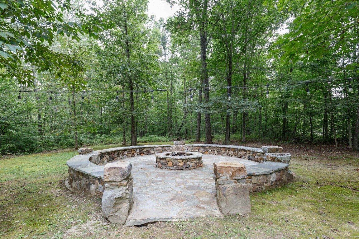 5660 Pinewood Road Franklin, TN 37064 - Photo 40 of 45 a view of a swimming pool with a patio