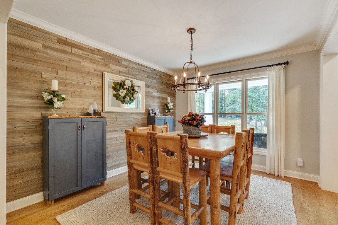 5660 Pinewood Road Franklin, TN 37064 - Photo 5 of 45 a view of a dining room with furniture window and wooden floor