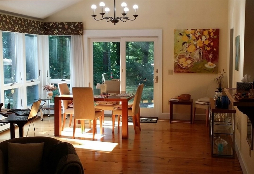 43 Poponessett Road Barnstable, MA 02635 - Photo 6 of 29 a view of a dining room with furniture window and outside view