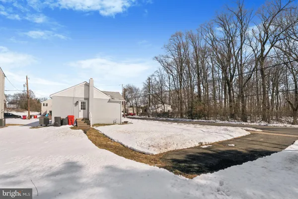 a view of a backyard of a house