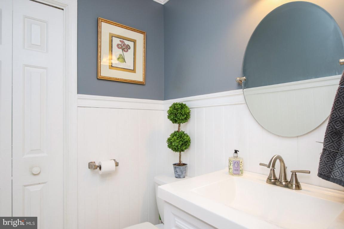 8141 Stone Ridge Drive Frederick, MD 21702 - Photo 12 of 33 Wainscoting and linen closet in the half bath