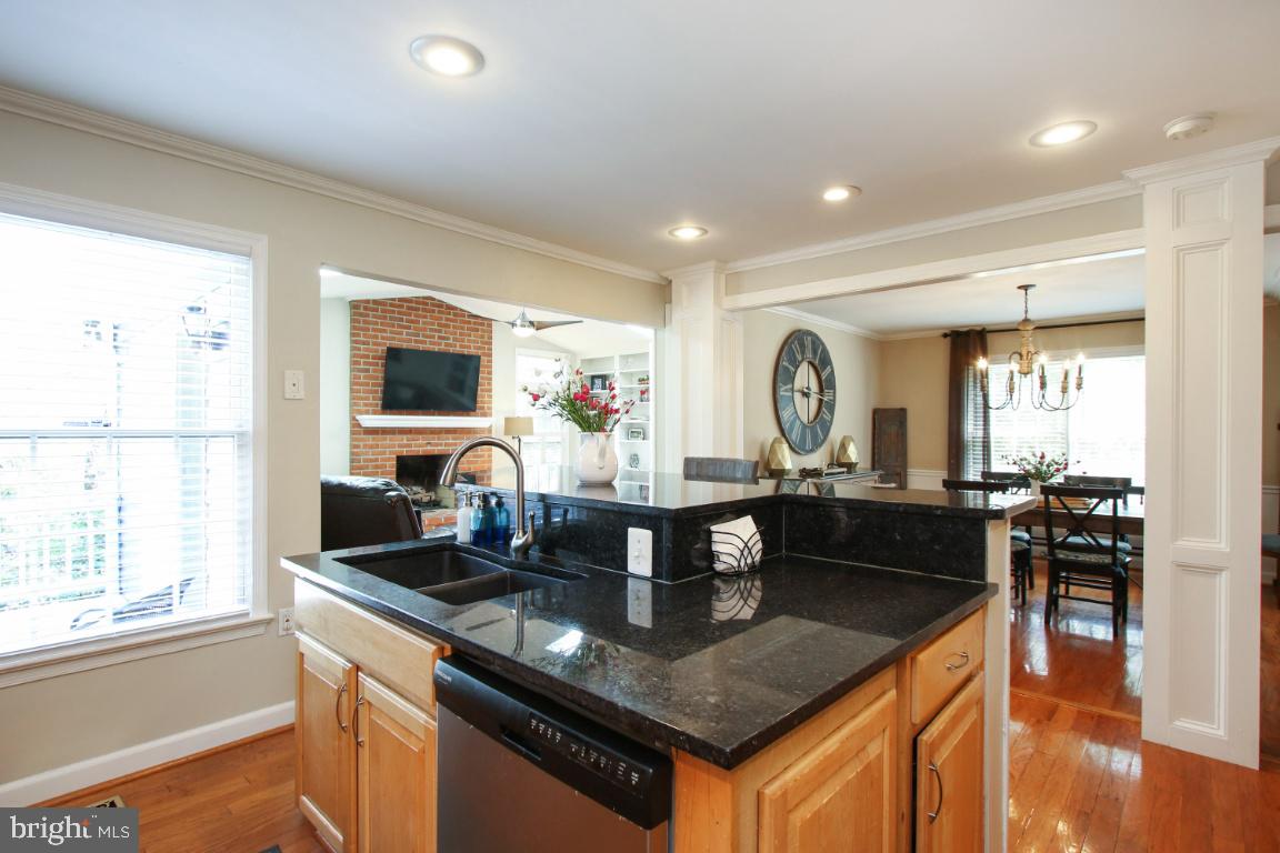 8141 Stone Ridge Drive Frederick, MD 21702 - Photo 8 of 33 Center island and granite countertops