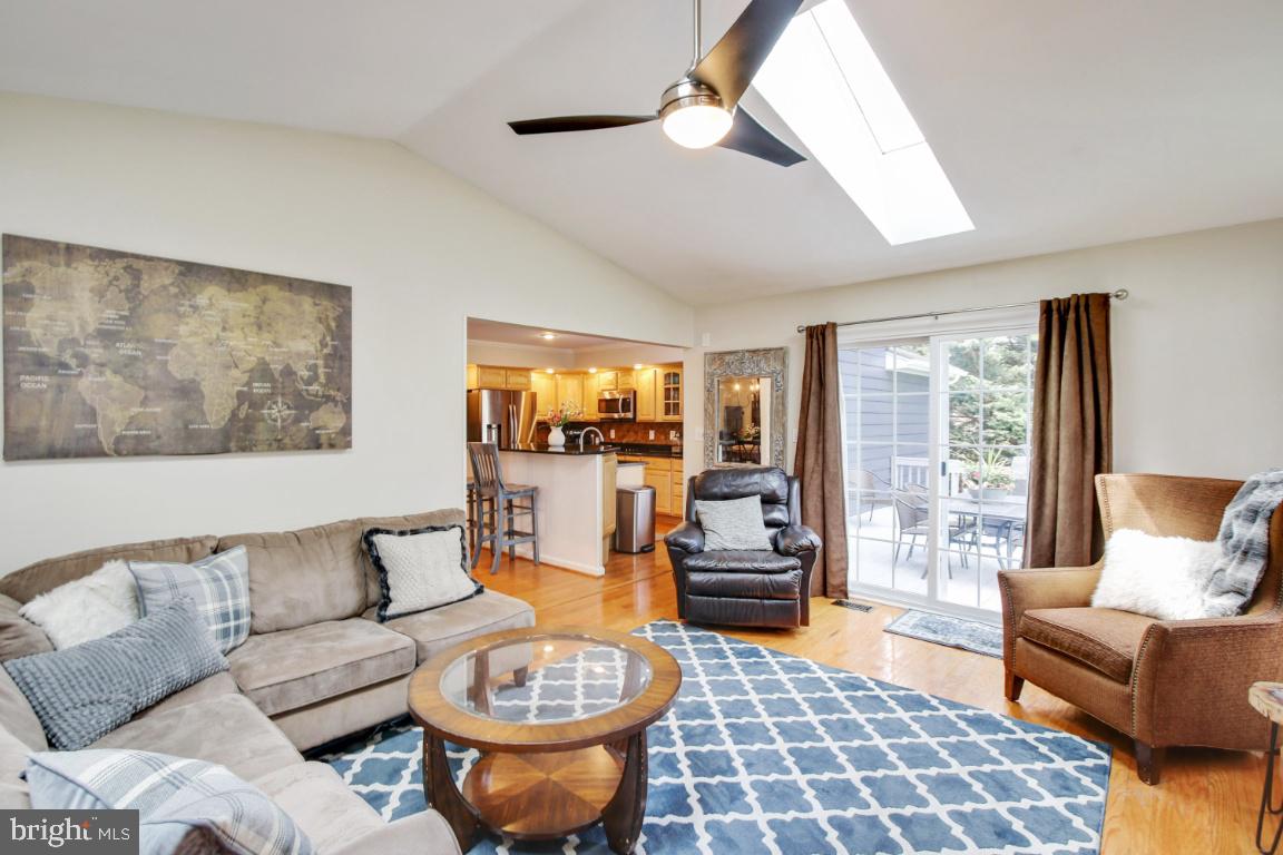 8141 Stone Ridge Drive Frederick, MD 21702 - Photo 10 of 33 Cozy and bright family room with skylights and fp!