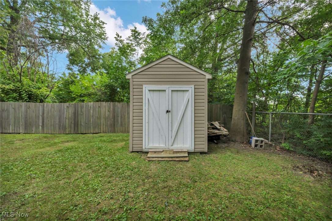 47655 Cooper Foster Park Road Amherst, OH 44001 - Photo 45 of 49 View of shed with a fenced backyard