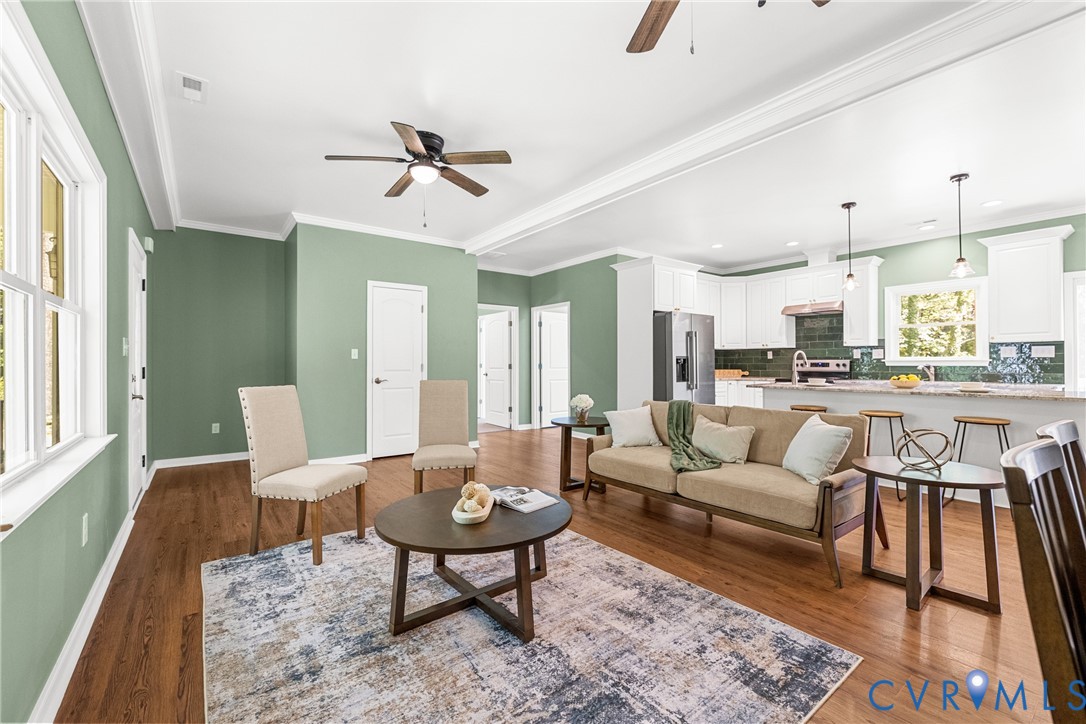 2211 Osborne Road Chester, VA 23831 - Photo 20 of 42 Open-concept living space featuring laminate floor