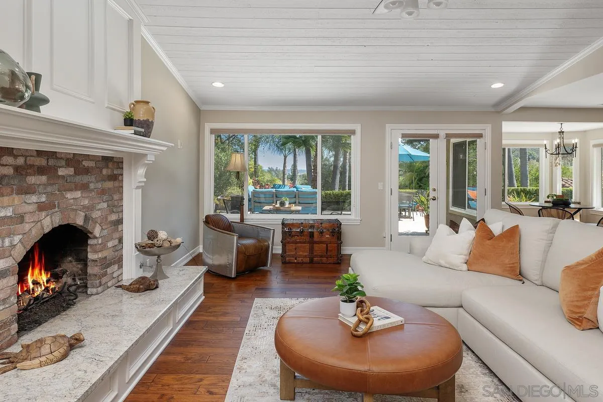 13627 Poway Springs Road Poway, CA 92064 - Photo 18 of 60 a living room with furniture and a fireplace
