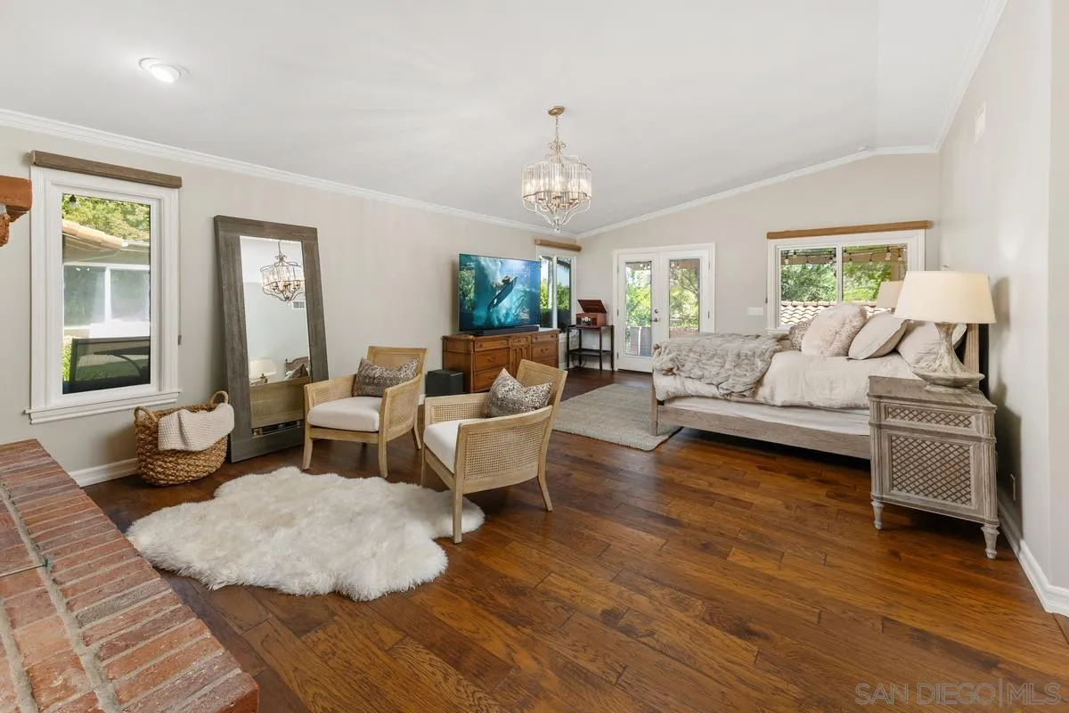 13627 Poway Springs Road Poway, CA 92064 - Photo 23 of 60 a living room with furniture or couch and a wooden floor