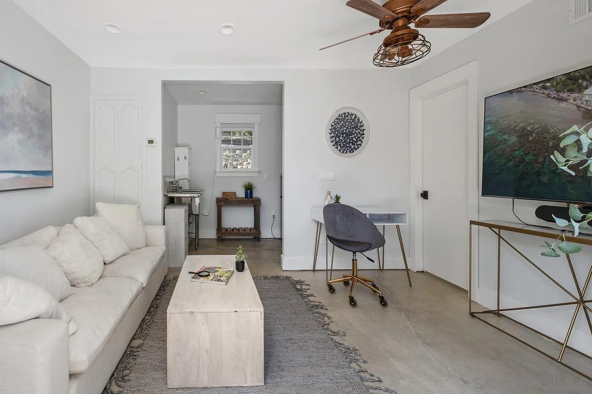 13627 Poway Springs Road Poway, CA 92064 - Photo 44 of 60 a living room with furniture and a flat screen tv