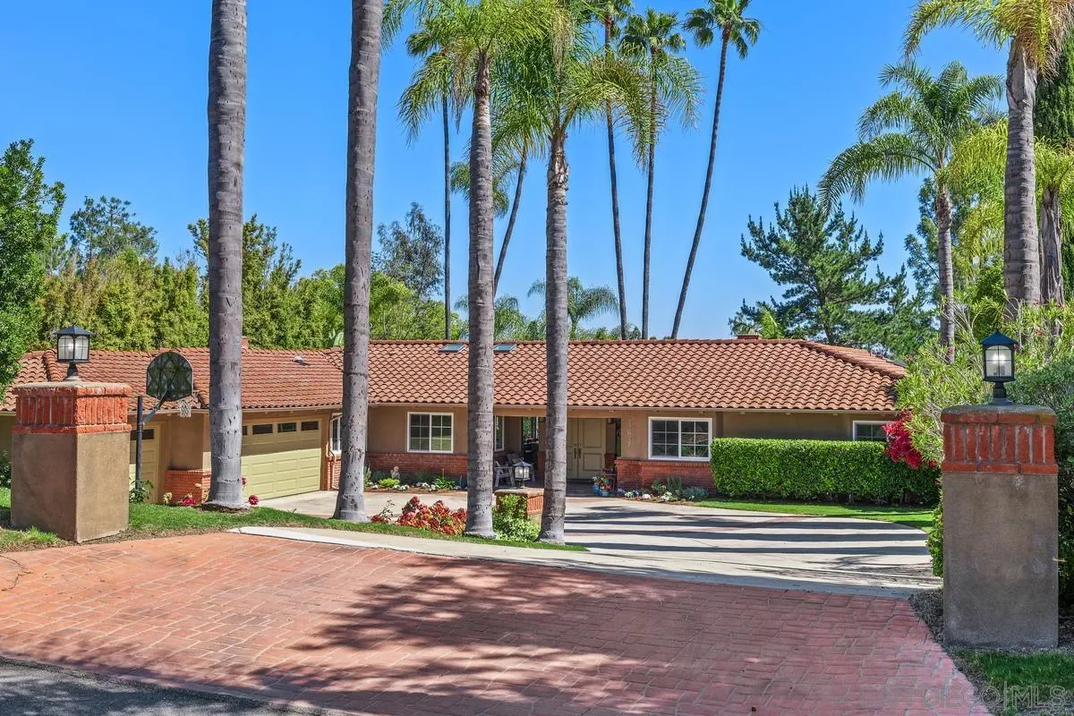 13627 Poway Springs Road Poway, CA 92064 - Photo 56 of 60 a front view of a house with a garden