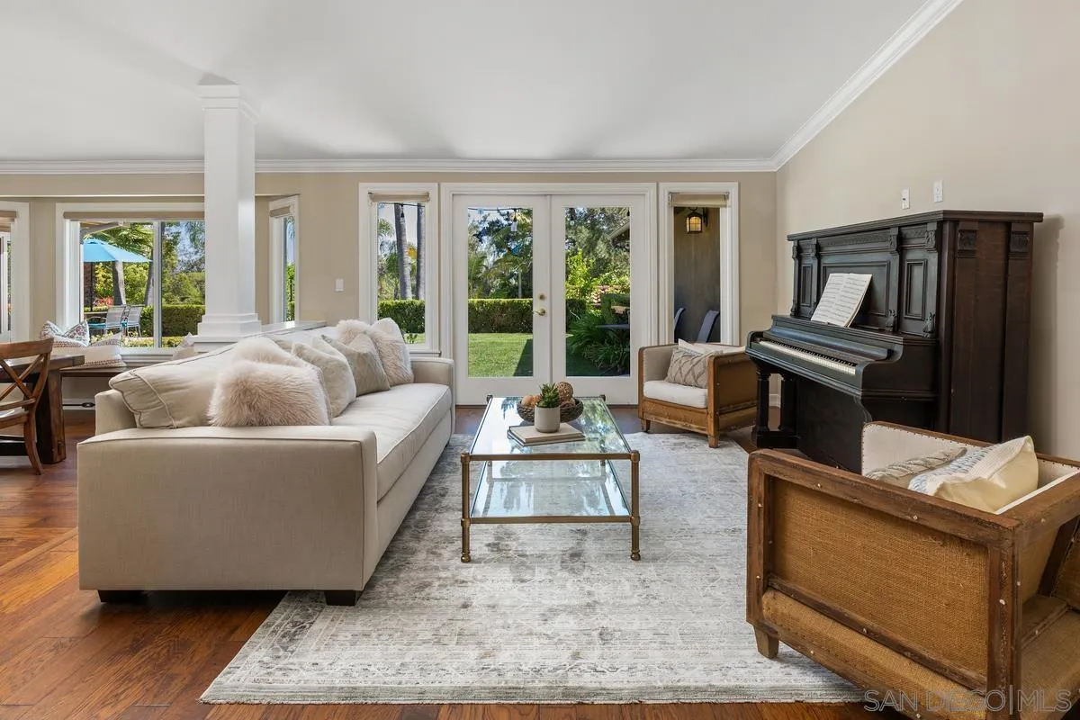 13627 Poway Springs Road Poway, CA 92064 - Photo 6 of 60 a living room with furniture and a flat screen tv