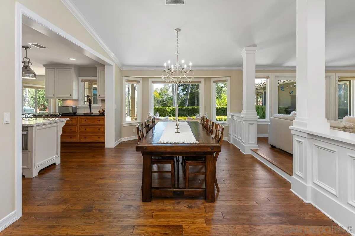 13627 Poway Springs Road Poway, CA 92064 - Photo 9 of 60 a view of a dining room with furniture window and wooden floor