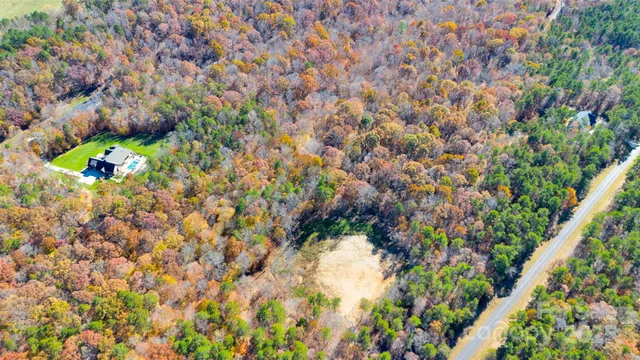 a view of a yard covered with snow