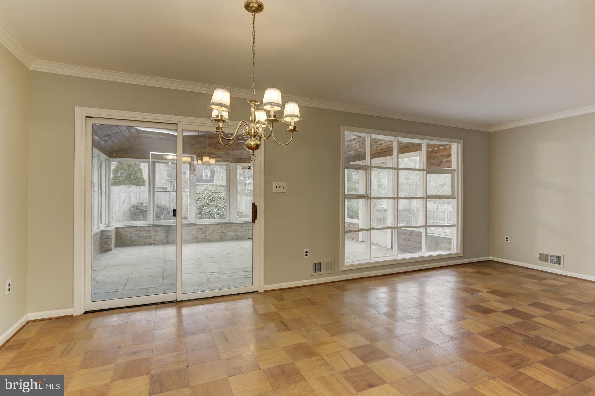 6104 Goodman Road Laurel, MD 20707 - Photo 10 of 42 Sliders from dining room to huge sun room!