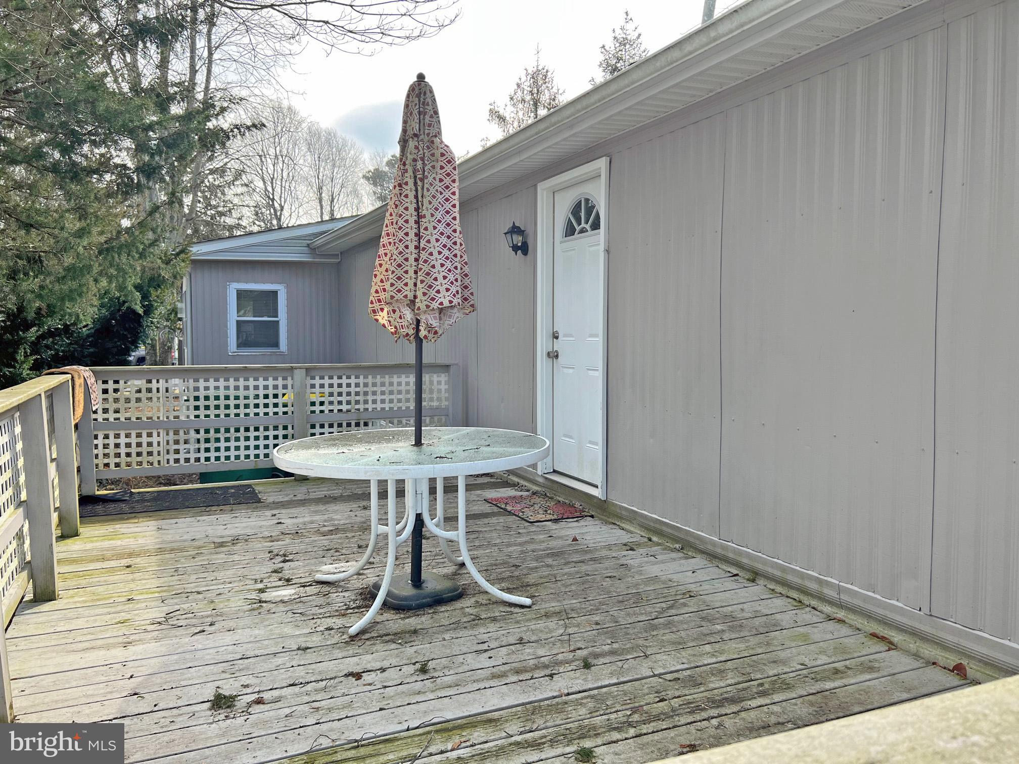 33937 Cedar Road, Unit 86 Lewes, DE 19958 - Photo 20 of 22 Side Deck