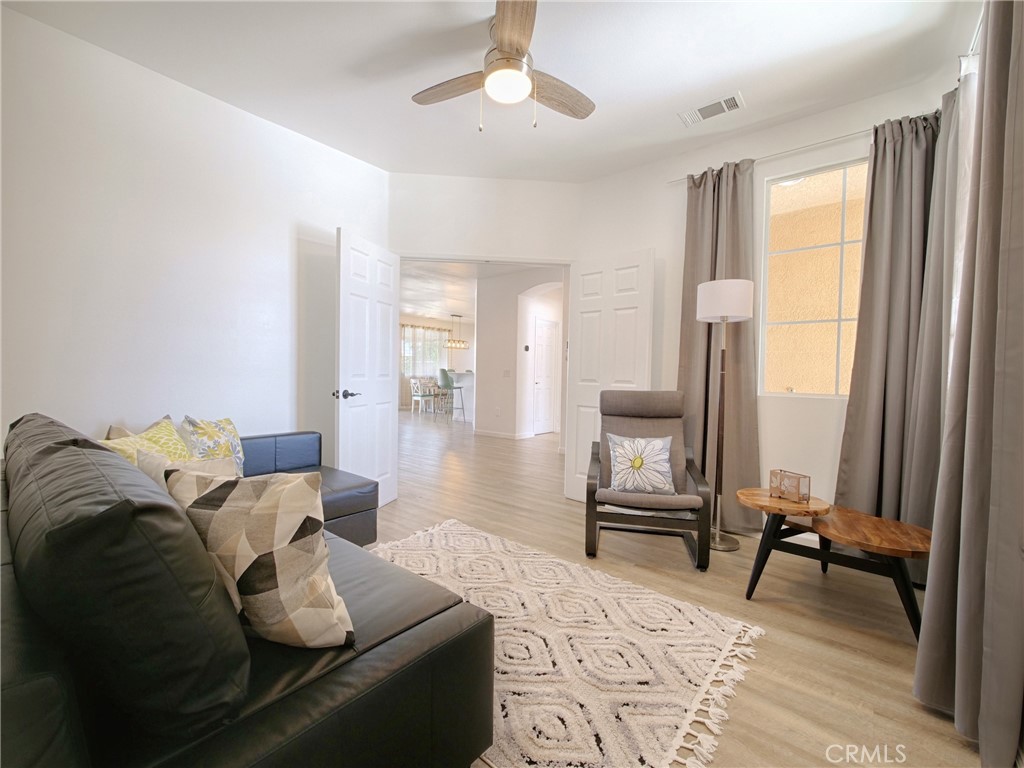 80718 Mountain Mesa Drive Indio, CA 92201 - Photo 18 of 47 a living room with furniture and a window