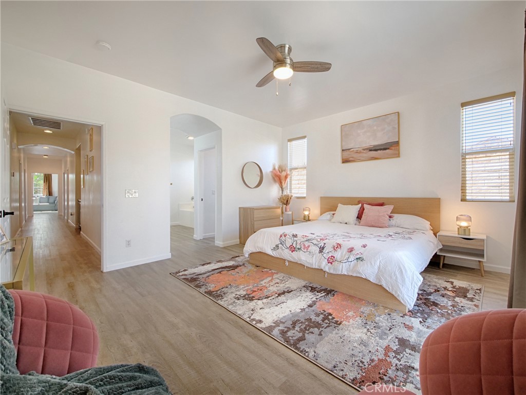 80718 Mountain Mesa Drive Indio, CA 92201 - Photo 21 of 47 a bedroom with a bed and window