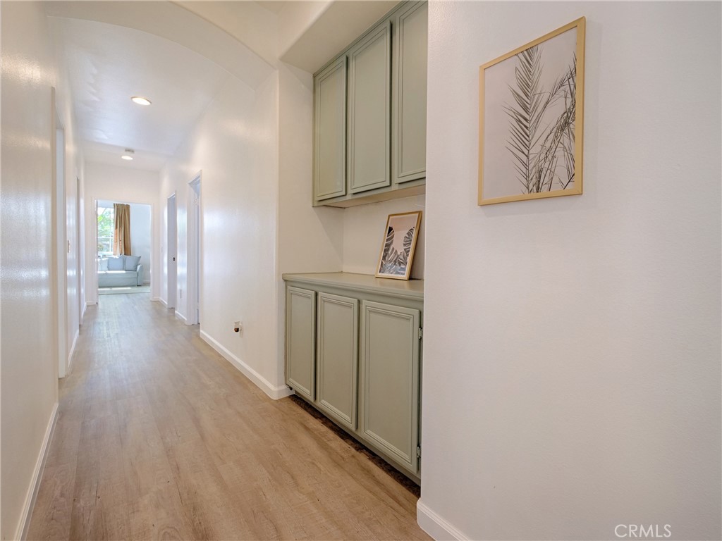 80718 Mountain Mesa Drive Indio, CA 92201 - Photo 24 of 47 a view of a hallway with wooden floor