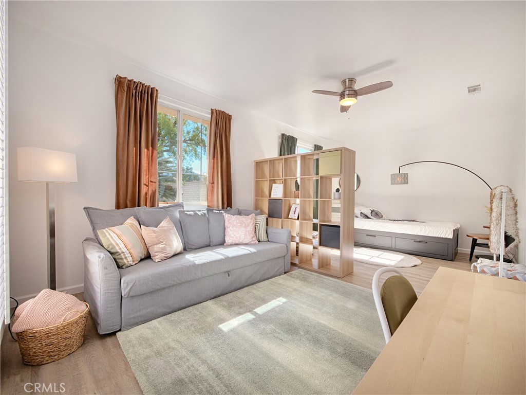80718 Mountain Mesa Drive Indio, CA 92201 - Photo 25 of 47 a living room with furniture and a large window