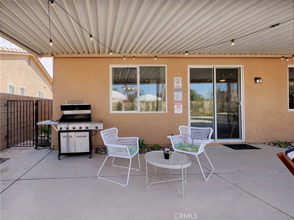 80718 Mountain Mesa Drive Indio, CA 92201 - Photo 44 of 47 a dining room with furniture and window