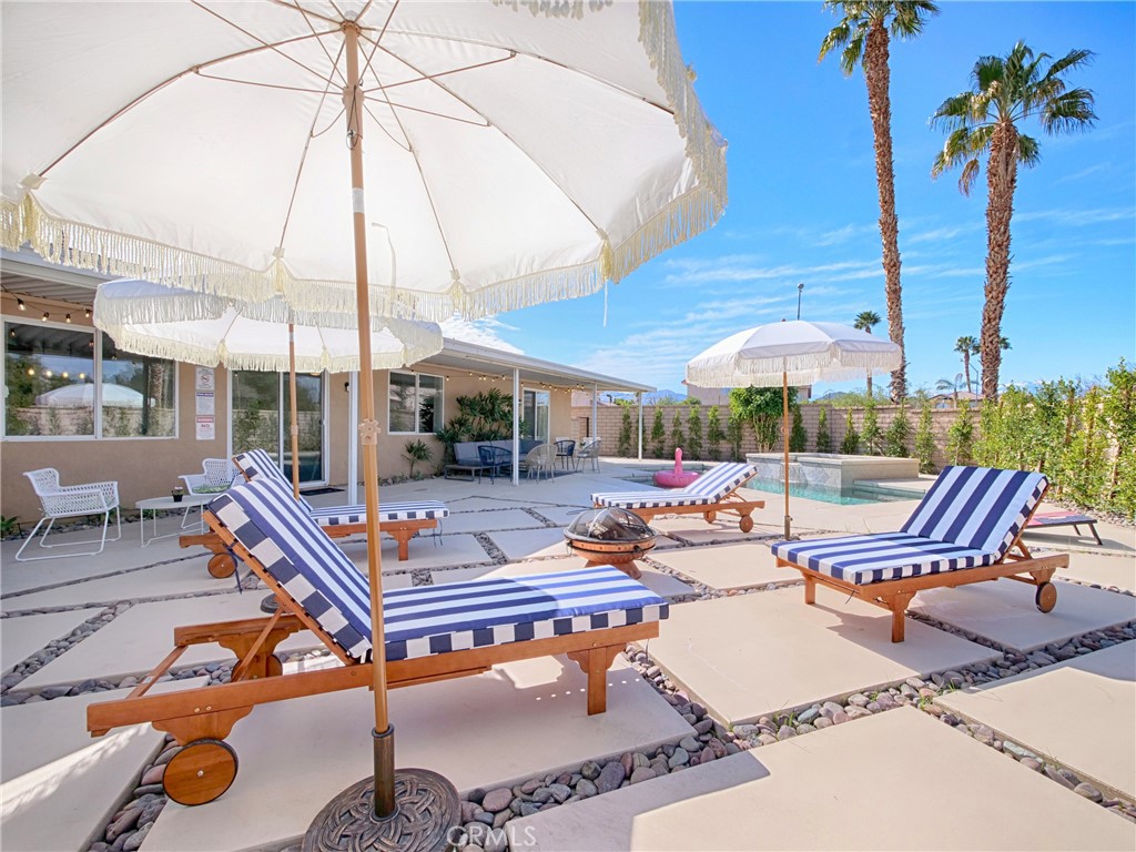 80718 Mountain Mesa Drive Indio, CA 92201 - Photo 45 of 47 a outdoor space with patio lots of furniture