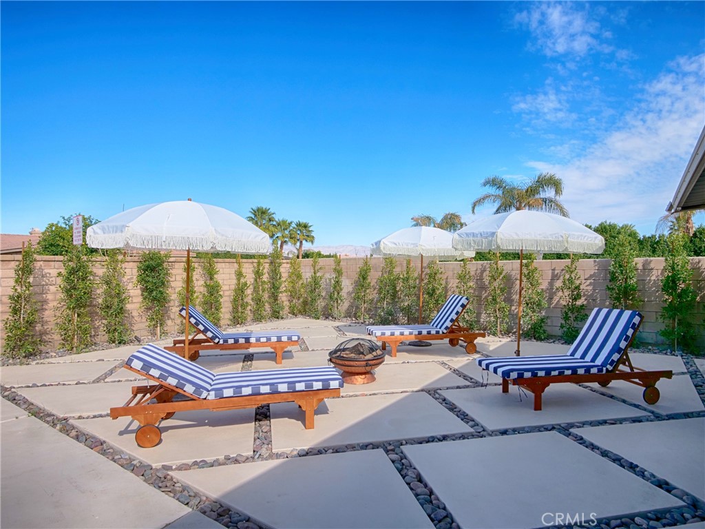 80718 Mountain Mesa Drive Indio, CA 92201 - Photo 46 of 47 a outdoor space with patio furniture