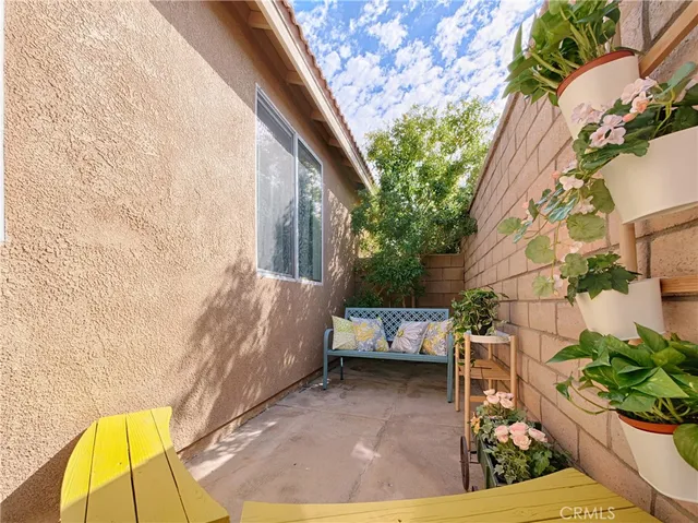 a view of backyard with a table and chair