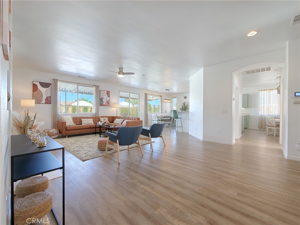 80718 Mountain Mesa Drive Indio, CA 92201 - Photo 5 of 47 a living room with furniture and wooden floor