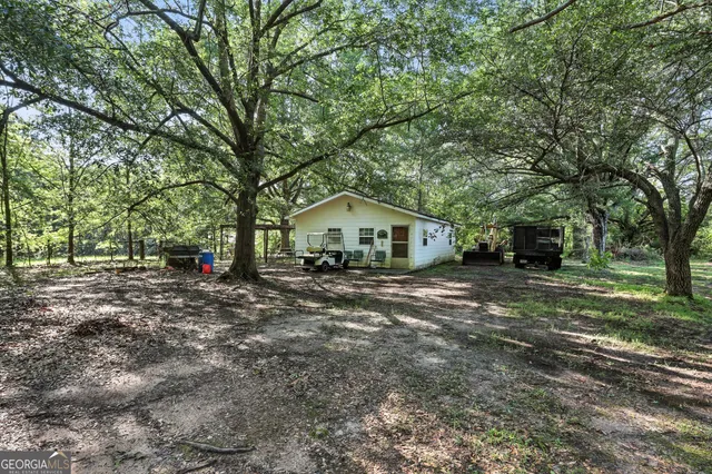 a house view with a outdoor space