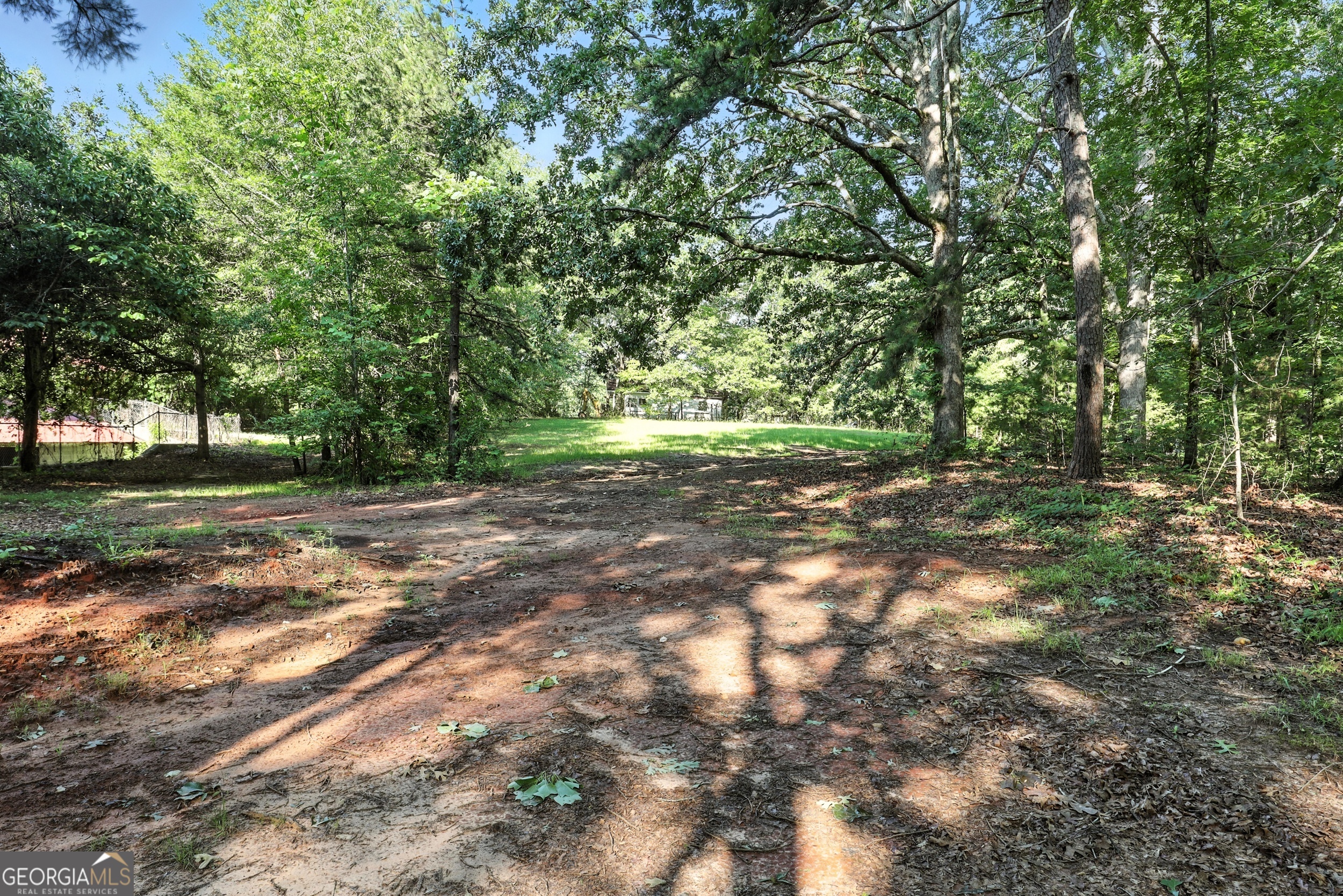 1592 Black Mountain Road Toccoa, GA 30577 - Photo 18 of 30 a view of outdoor space with trees all around