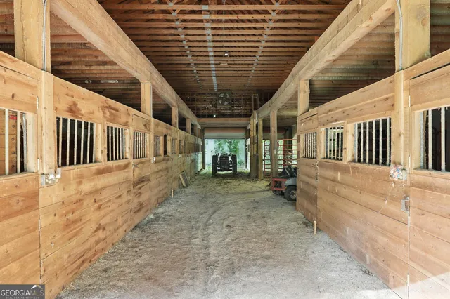 a view of small house with large windows
