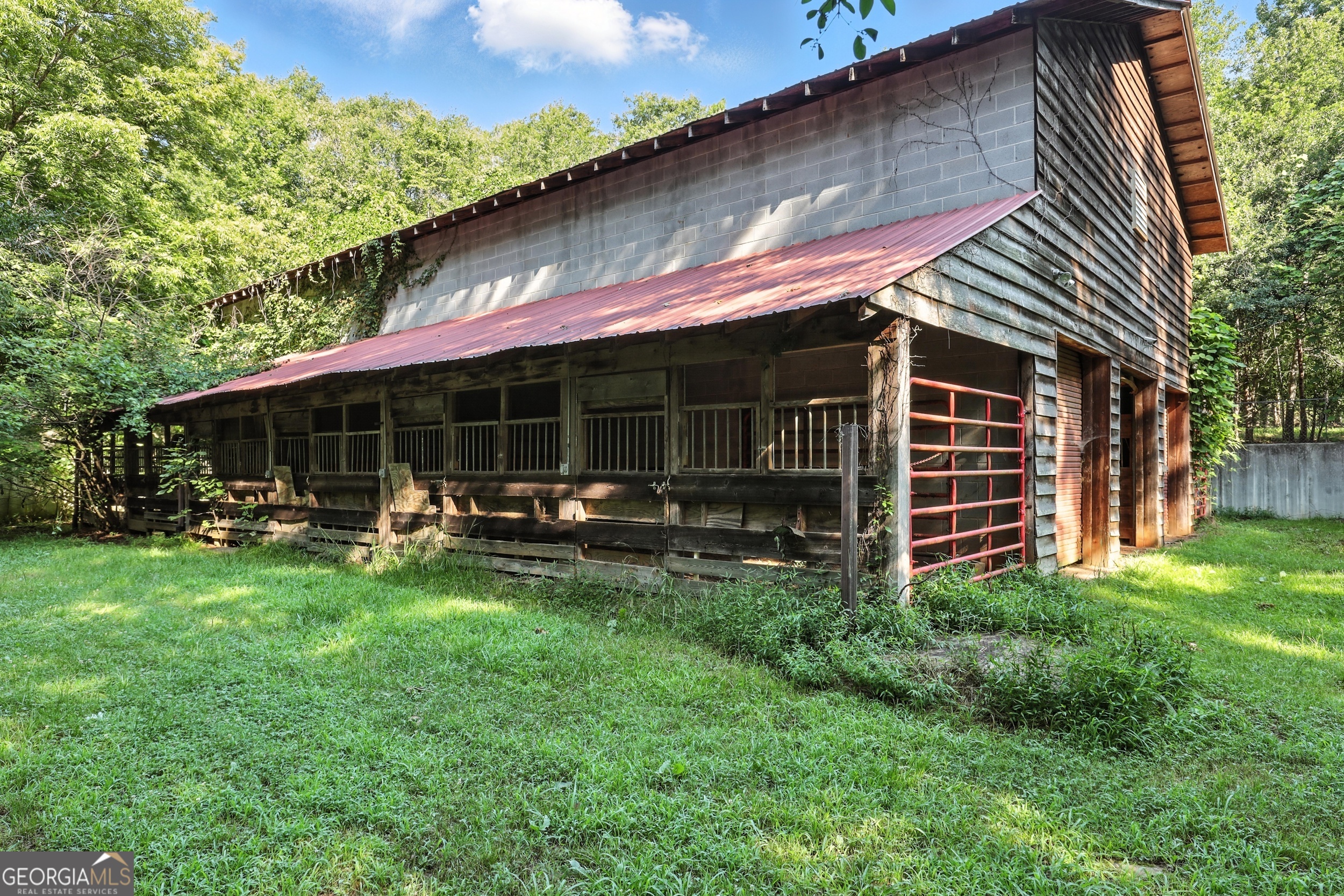 1592 Black Mountain Road Toccoa, GA 30577 - Photo 3 of 30 a view of a house with backyard sitting area and garden