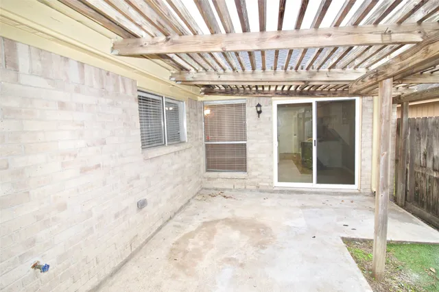 front view of a house with a large window