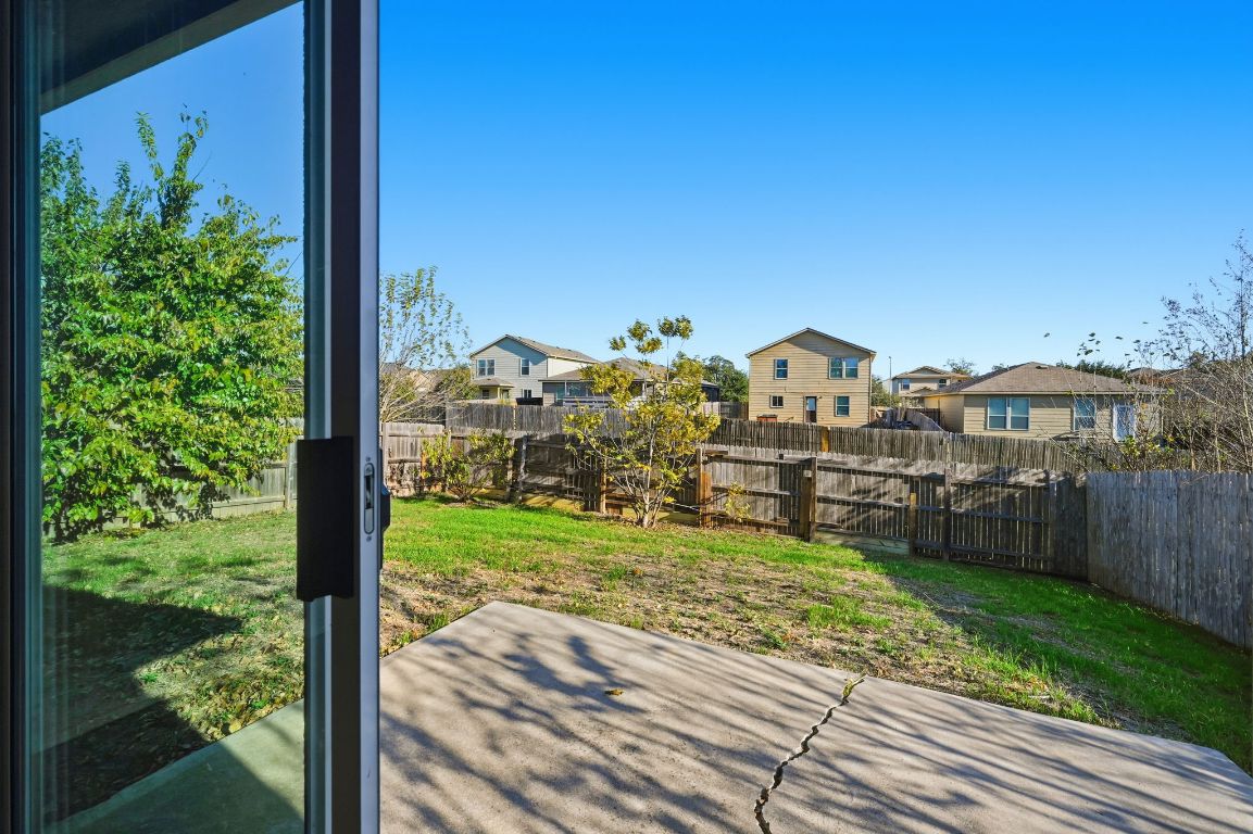 5813 Berryline Way Austin, TX 78724 - Photo 23 of 27 a view of a terrace with a garden