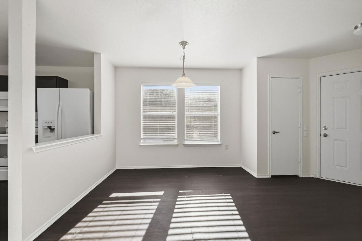 5813 Berryline Way Austin, TX 78724 - Photo 9 of 27 a view of a room with windows