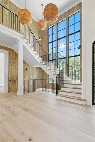 a kitchen with kitchen island granite countertop a table and chairs in it