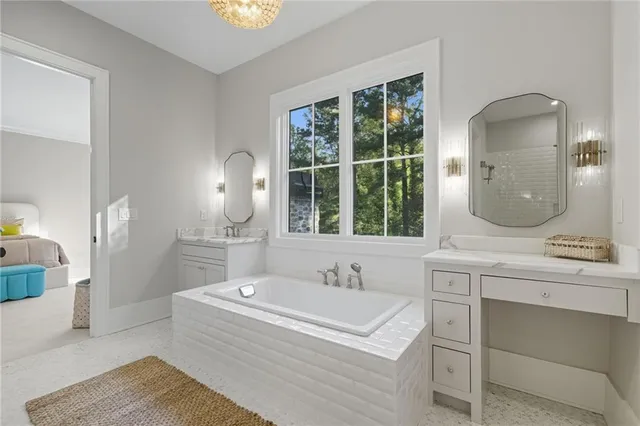 a bathroom with a double vanity sink and mirror